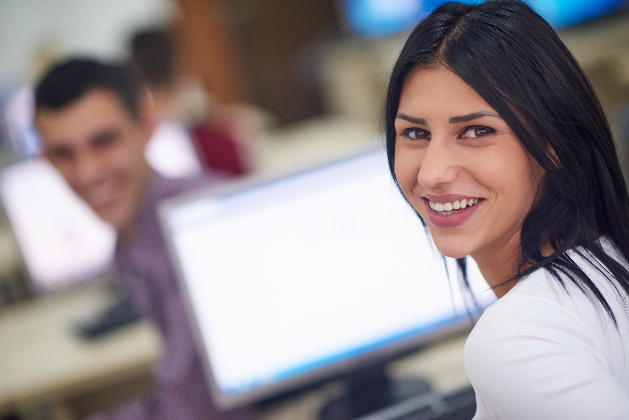 portrait of young female student at school classroom